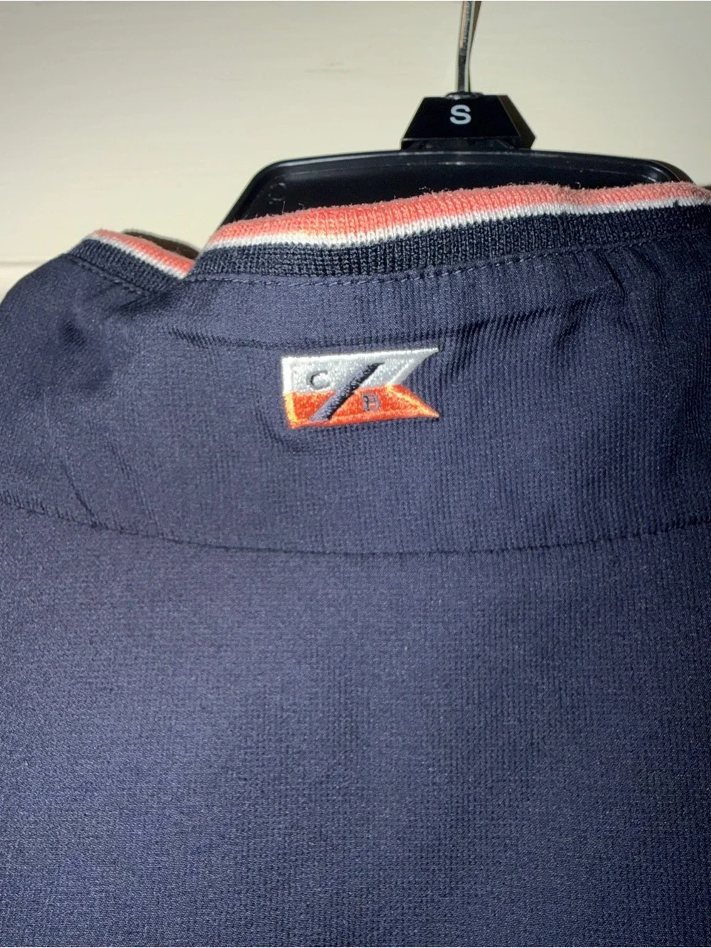 Cutter & Buck ladies Navy Sleeveless Golf Pullover with Coral Trim